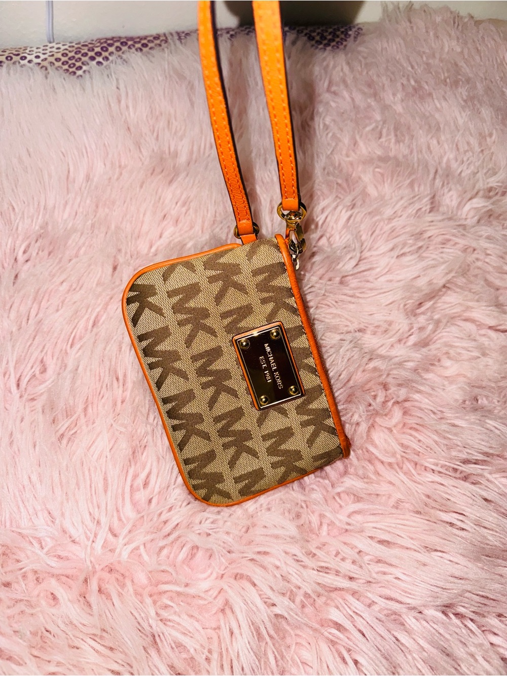 Michael Kors MK Wristlet Signature Logo Cavas Pattern with Orange Leather Trim.